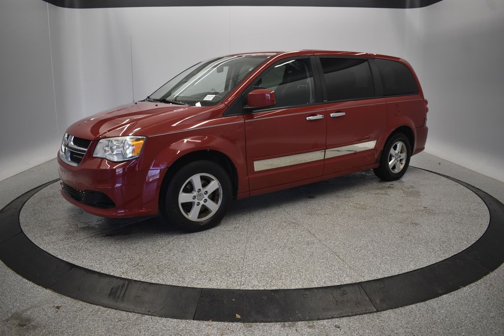 Used 2013 Dodge Grand Caravan SXT with VIN 2C4RDGCG5DR523829 for sale in Coon Rapids, Minnesota