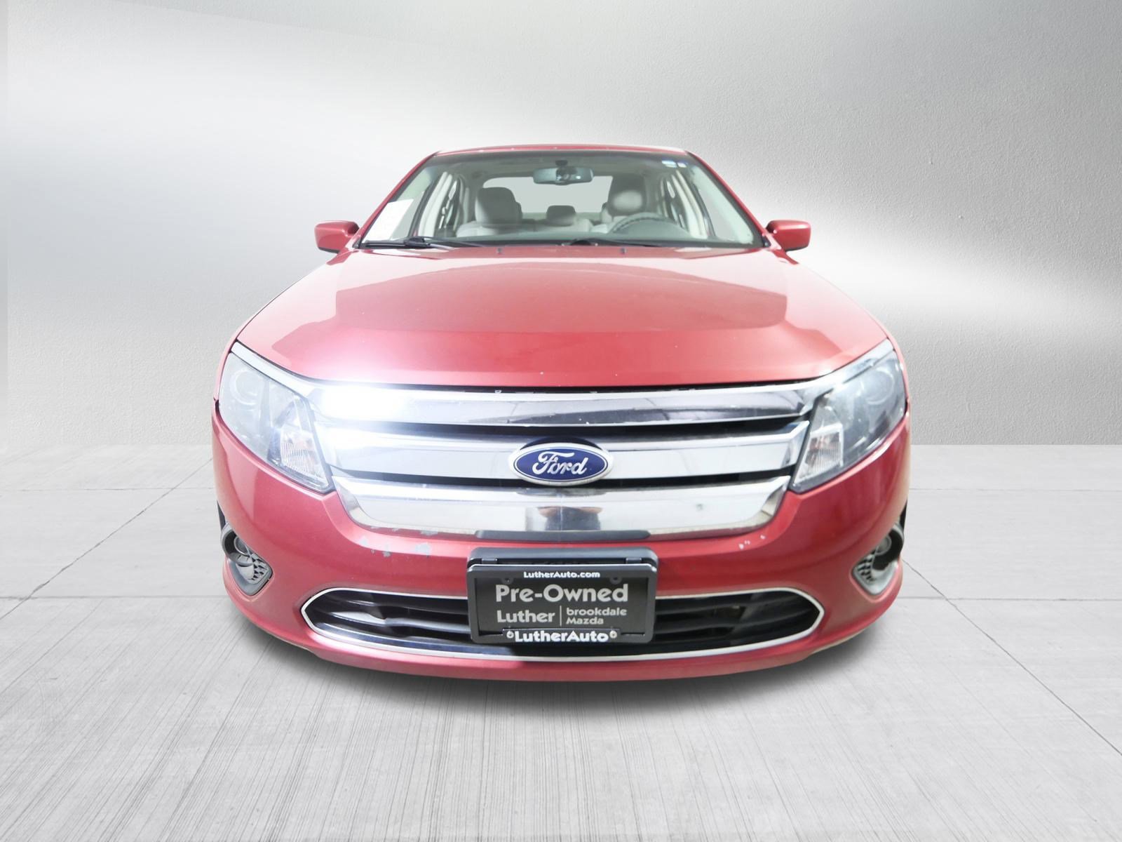 Used 2010 Ford Fusion SE with VIN 3FAHP0HA0AR402863 for sale in Brooklyn Center, Minnesota