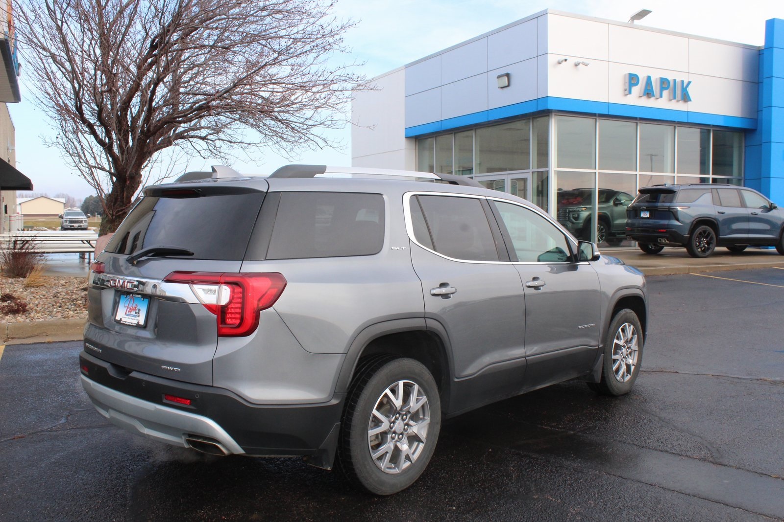 Used 2021 GMC Acadia SLT with VIN 1GKKNULS8MZ183247 for sale in Luverne, Minnesota