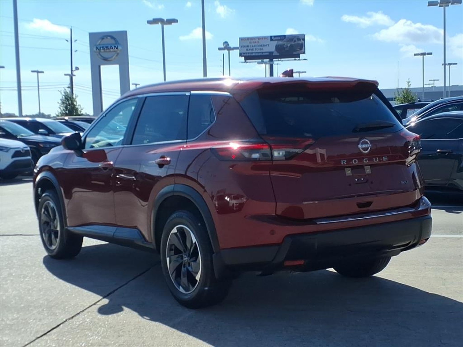 2024 Nissan Rogue SV Red at Robbins Nissan