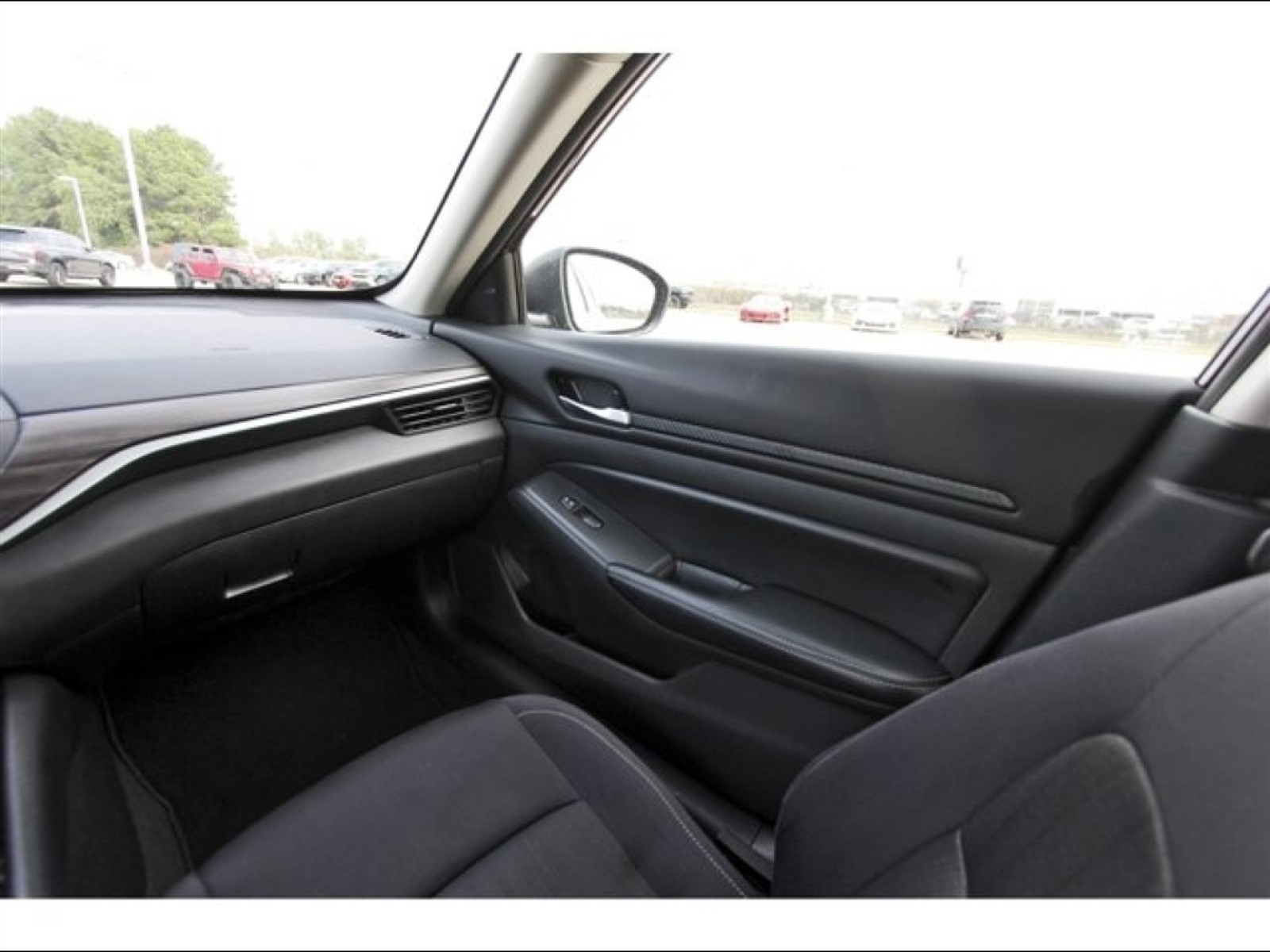 2024 Nissan Altima 2.5 SV Red at Robbins Nissan