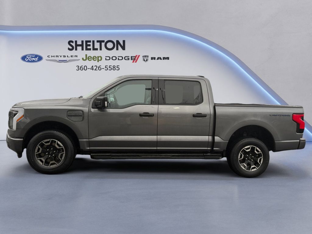 Used 2023 Ford F-150 Lightning XLT with VIN 1FTVW1EL2PWG50517 for sale in Shelton, WA