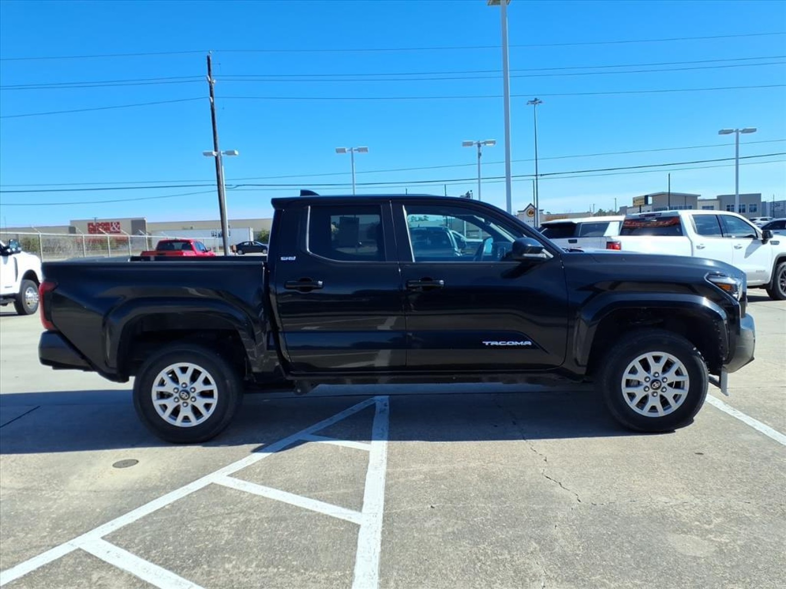 2024 Toyota Tacoma 4WD TRD Off Road Black at Robbins Nissan