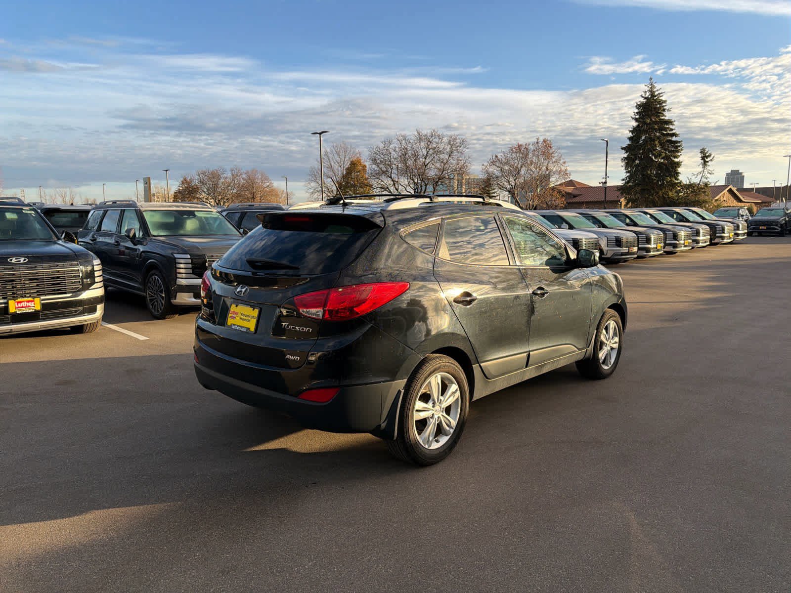 Used 2012 Hyundai Tucson GLS with VIN KM8JUCAC0CU372420 for sale in Minneapolis, MN