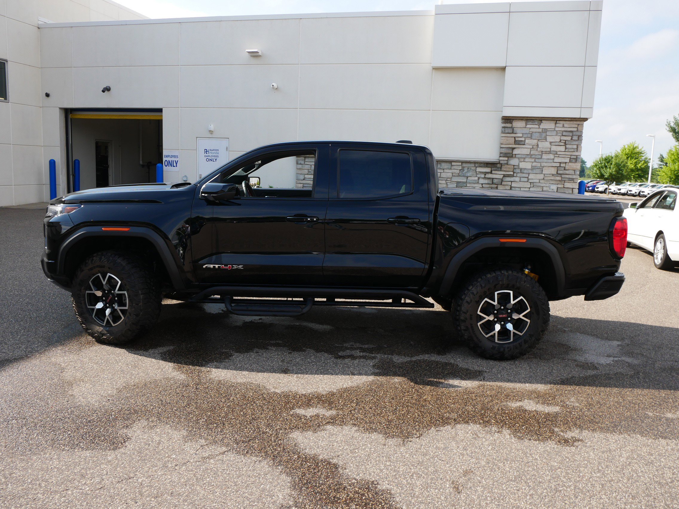 Used 2024 GMC Canyon AT4X with VIN 1GTP6EEK1R1296898 for sale in Coon Rapids, Minnesota