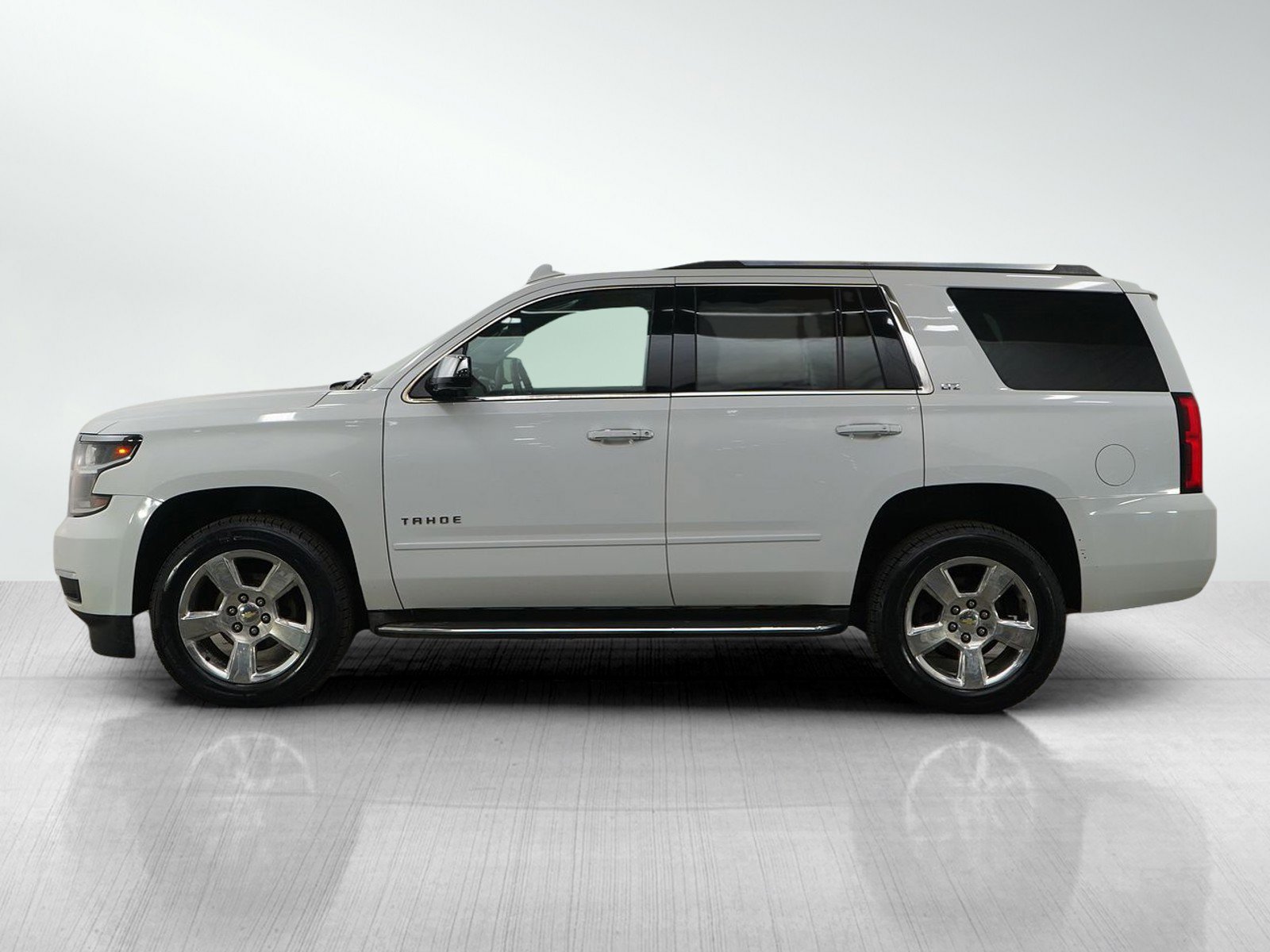 Used 2016 Chevrolet Tahoe LTZ with VIN 1GNSKCKC7GR261246 for sale in White Bear Lake, Minnesota