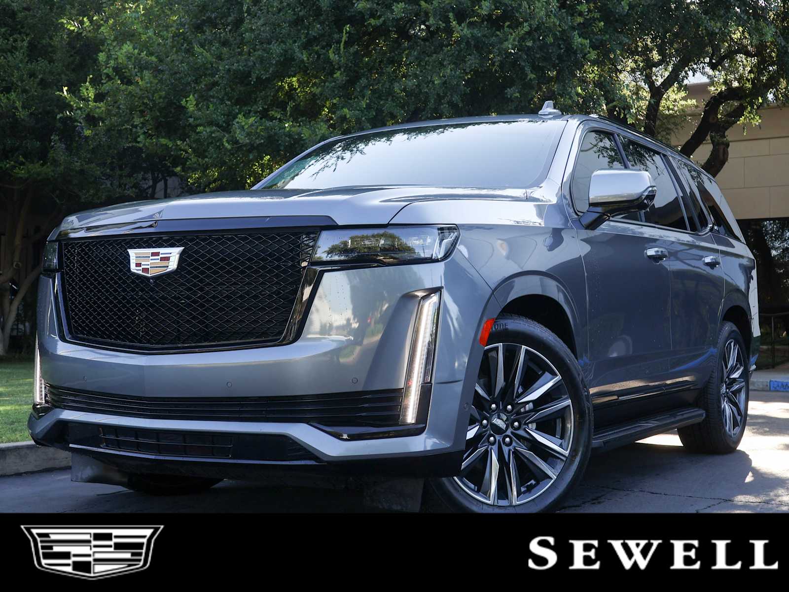 Used 2021 Satin Steel Metallic Cadillac Sport image 1