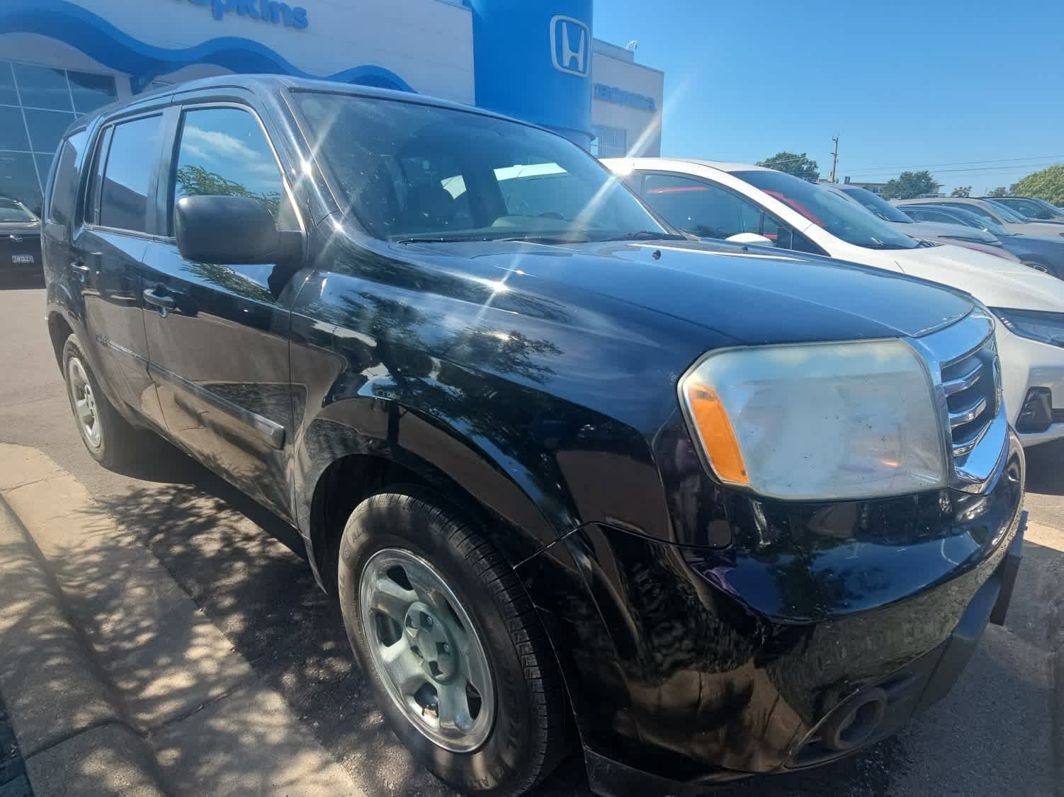 Used 2014 Honda Pilot LX with VIN 5FNYF4H20EB024435 for sale in Hopkins, Minnesota