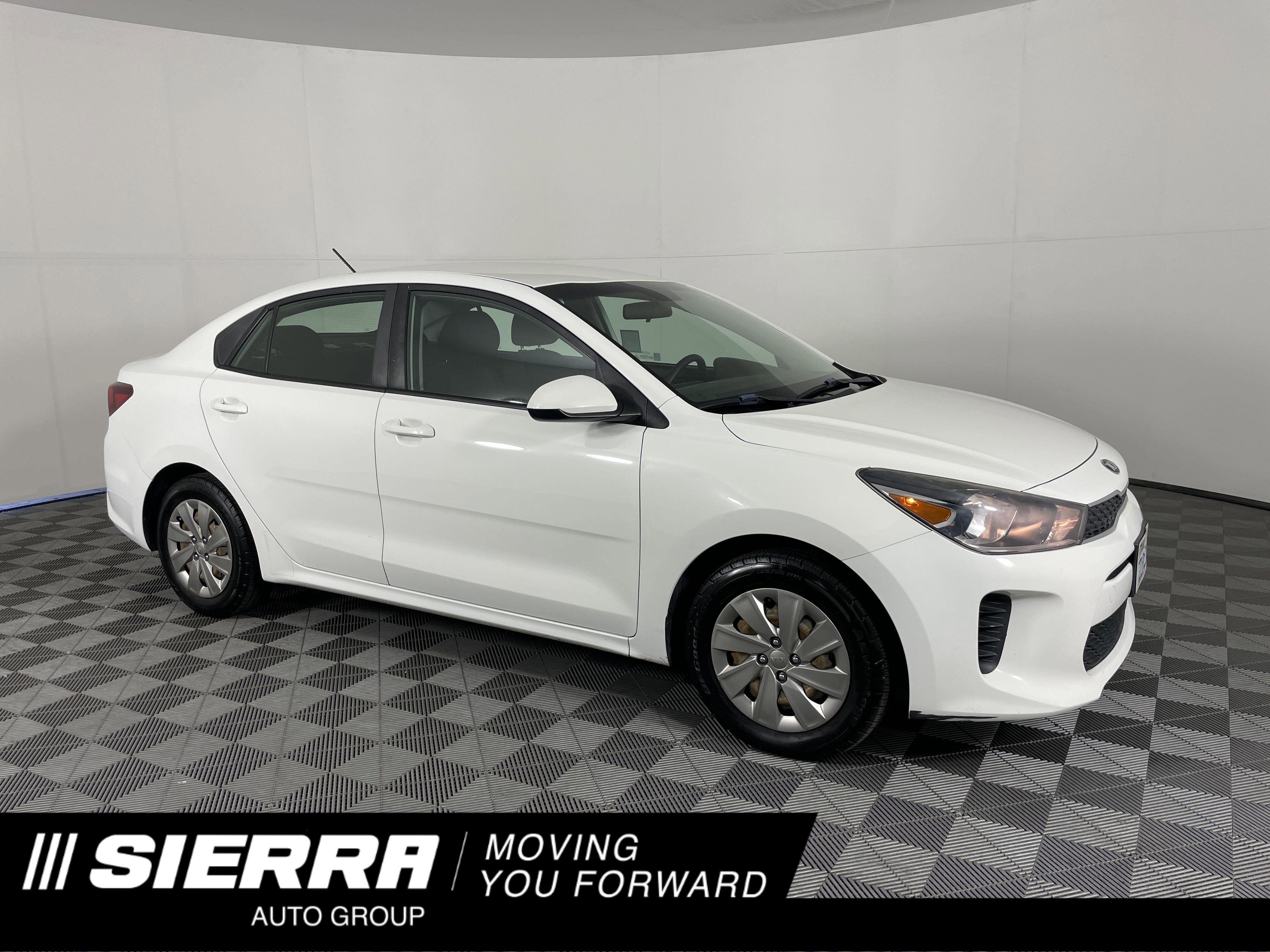 Used 2018 Clear White Kia S image 1