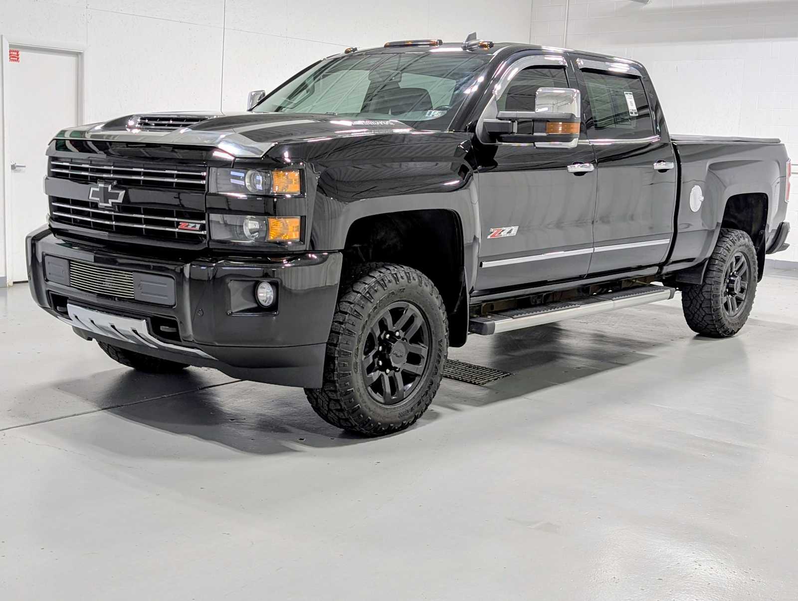 Pre-Owned 2019 Chevrolet Silverado 2500HD LTZ in Black