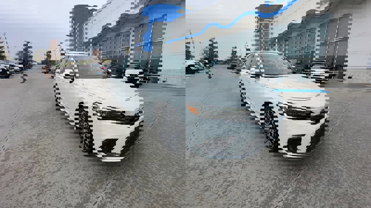 Certified 2023 Honda Civic Touring with VIN 2HGFE1F98PH324232 for sale in Kansas City