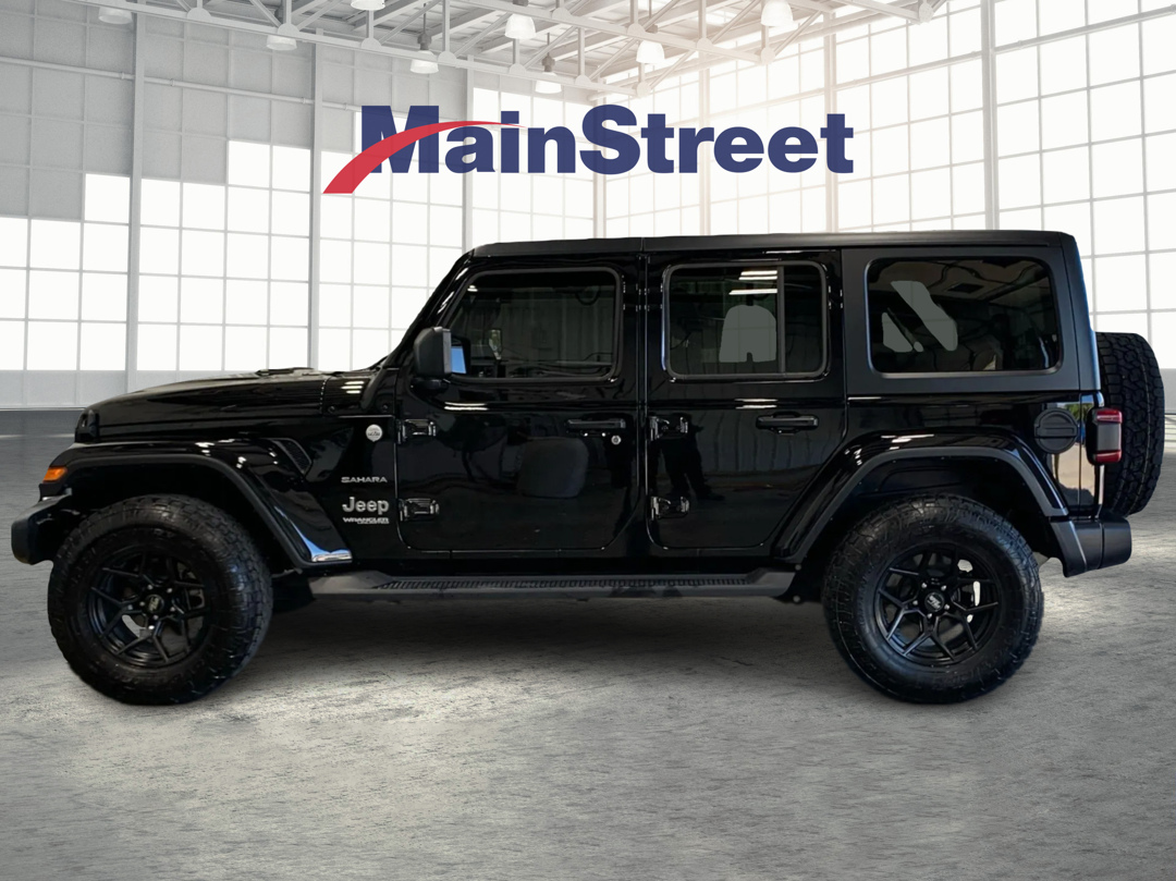 Used 2021 Jeep Wrangler Unlimited Sahara with VIN 1C4HJXENXMW702598 for sale in Kansas City