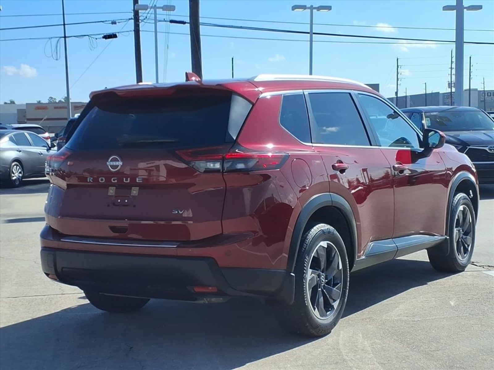 2024 Nissan Rogue SV Red at Robbins Nissan