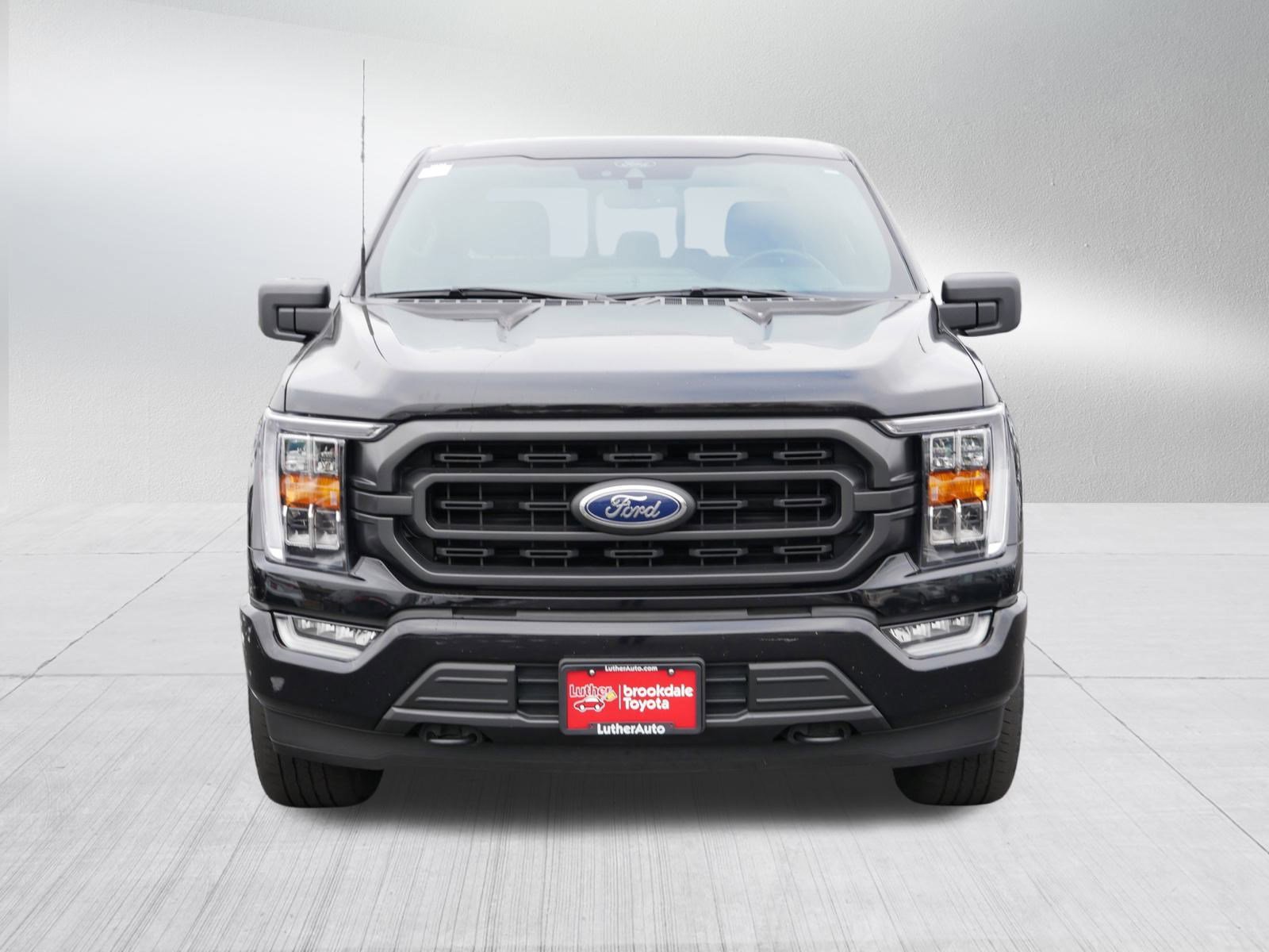 Used 2021 Ford F-150 XLT with VIN 1FTFW1E58MKE82701 for sale in Brooklyn Center, Minnesota