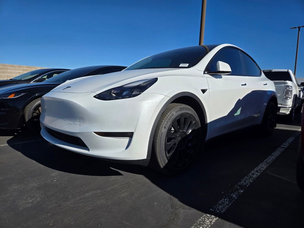 Used 2023 Tesla Model Y Long Range with VIN 7SAYGAEE6PF785311 for sale in Kansas City