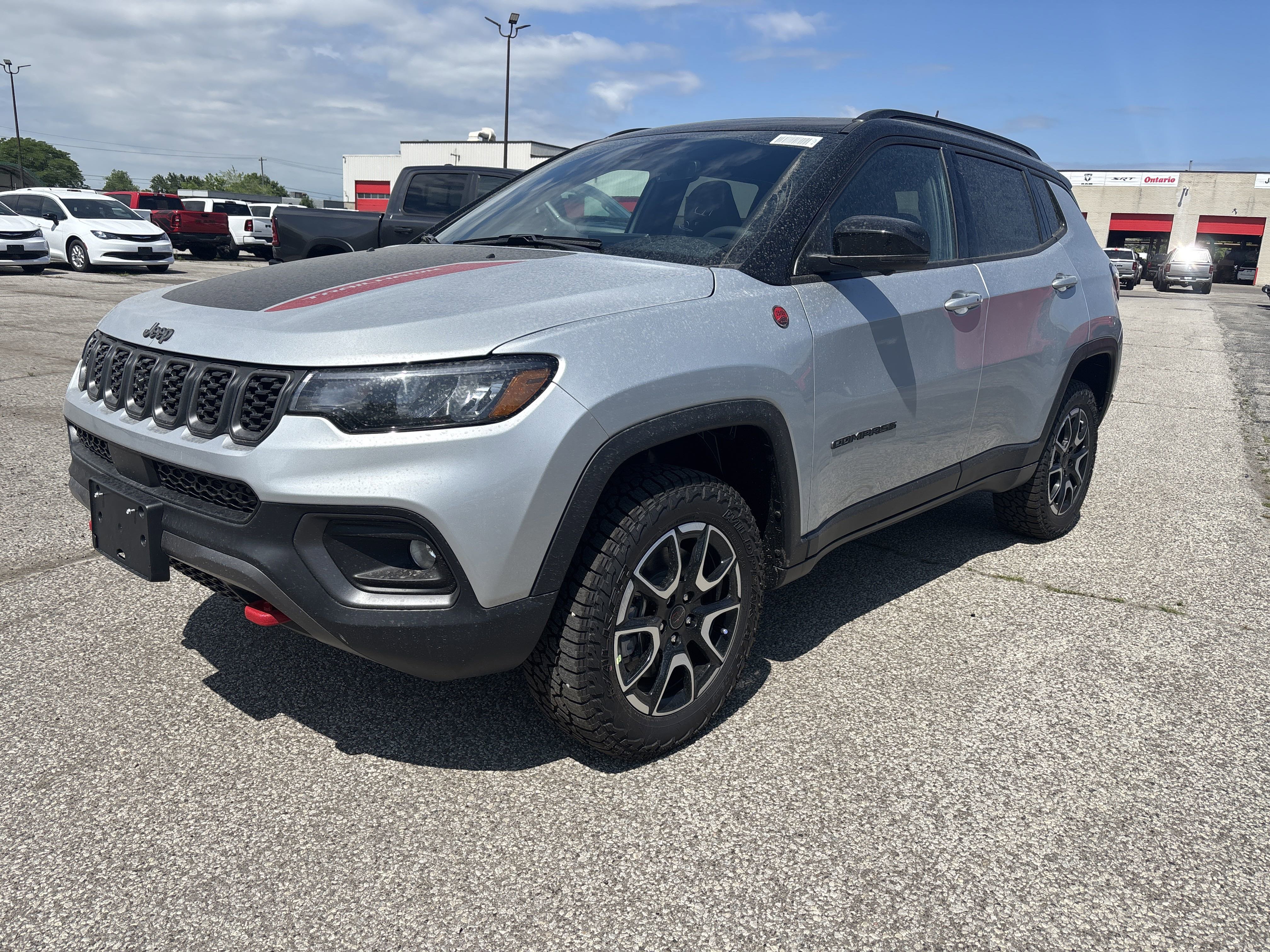 New 2025 Silver Zynith Metallic Jeep Trailhawk image 1