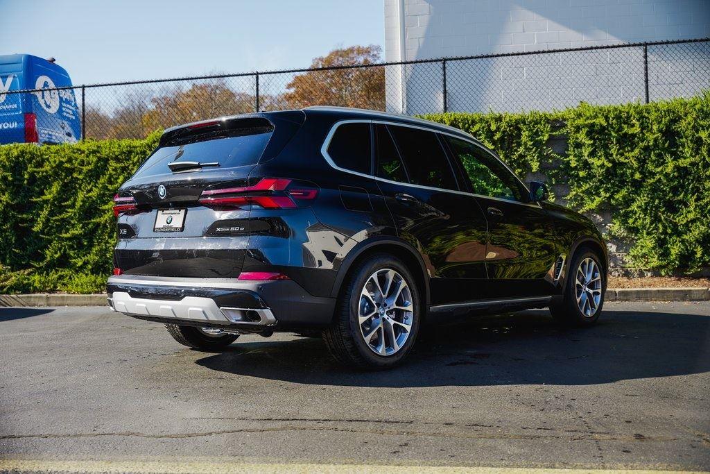 New 2025 Black Sapphire Metallic BMW xDrive50e image 7