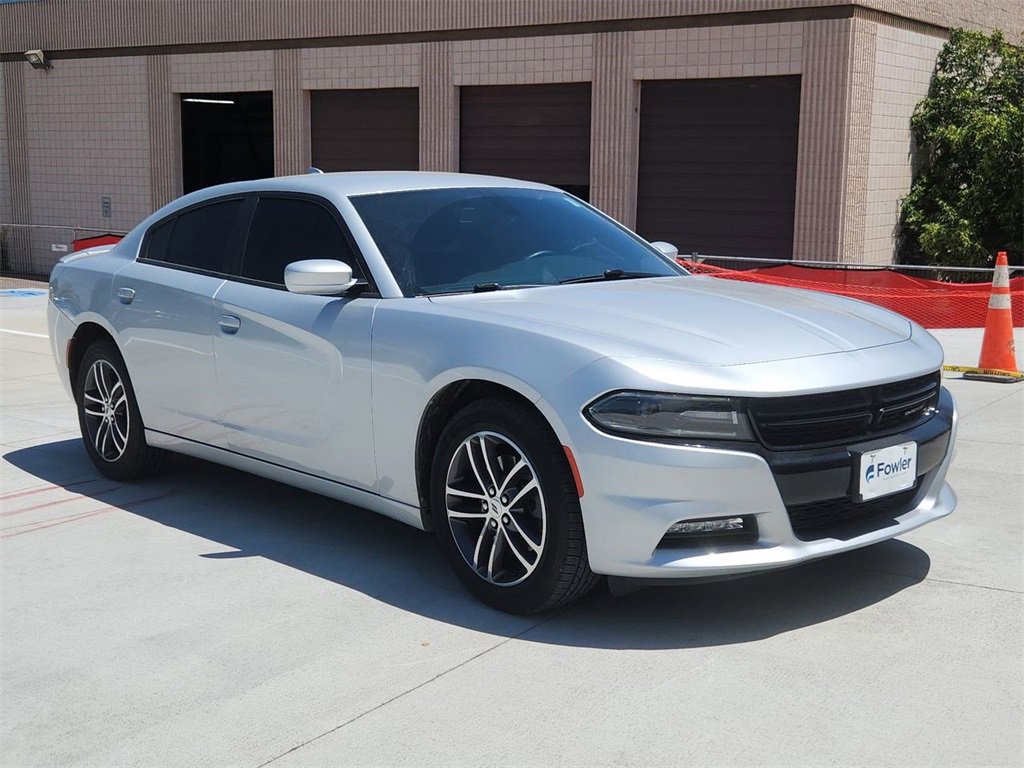 Used 2019 Dodge Charger SXT with VIN 2C3CDXJGXKH749770 for sale in Broomfield, CO