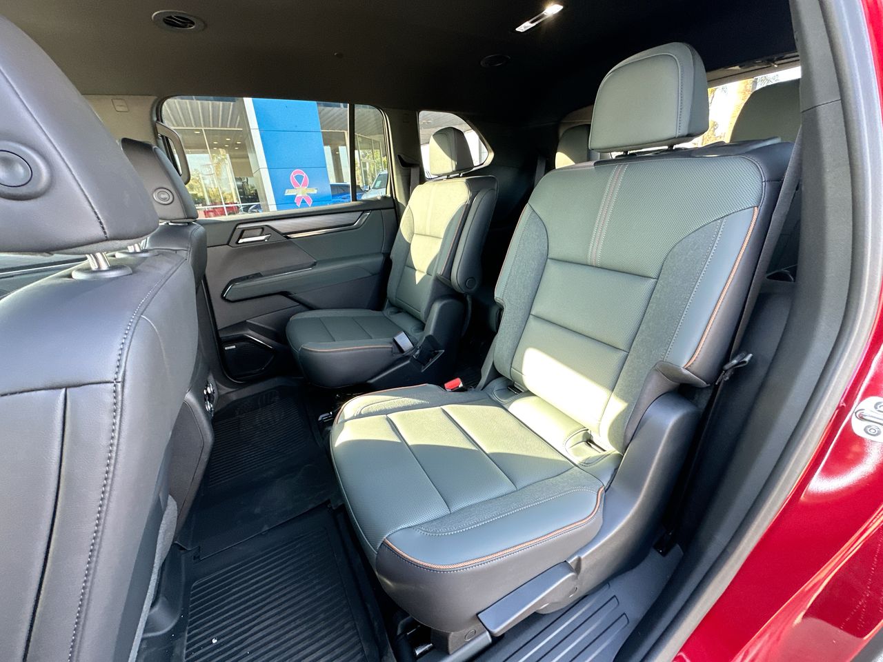 New 2024 Volcanic Red Tintcoat GMC AT4 image 1