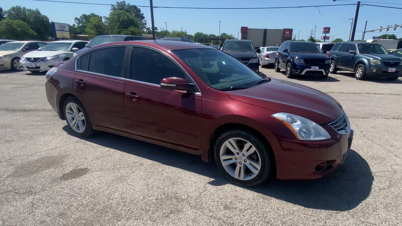 Used 2011 Red Nissan SR image 1