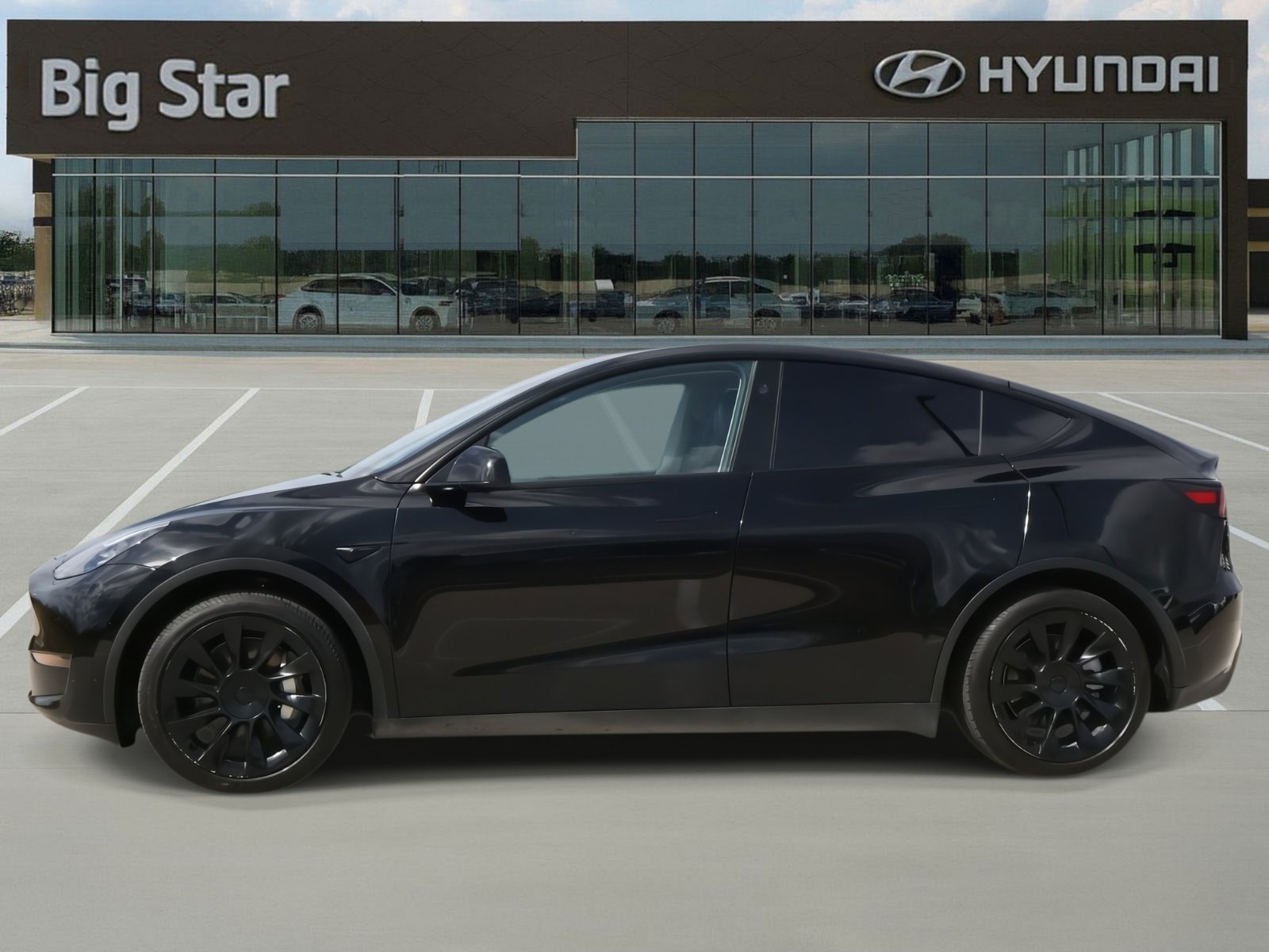 Used 2023 Tesla Model Y Long Range with VIN 7SAYGAEE6PF928094 for sale in Northfield, Minnesota