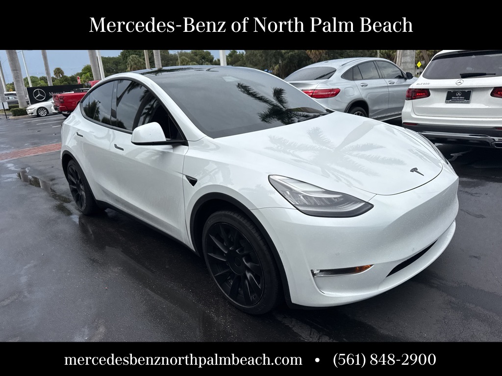 Used 2021 Tesla Model Y Standard Range with VIN 5YJYGDED2MF105874 for sale in Kansas City
