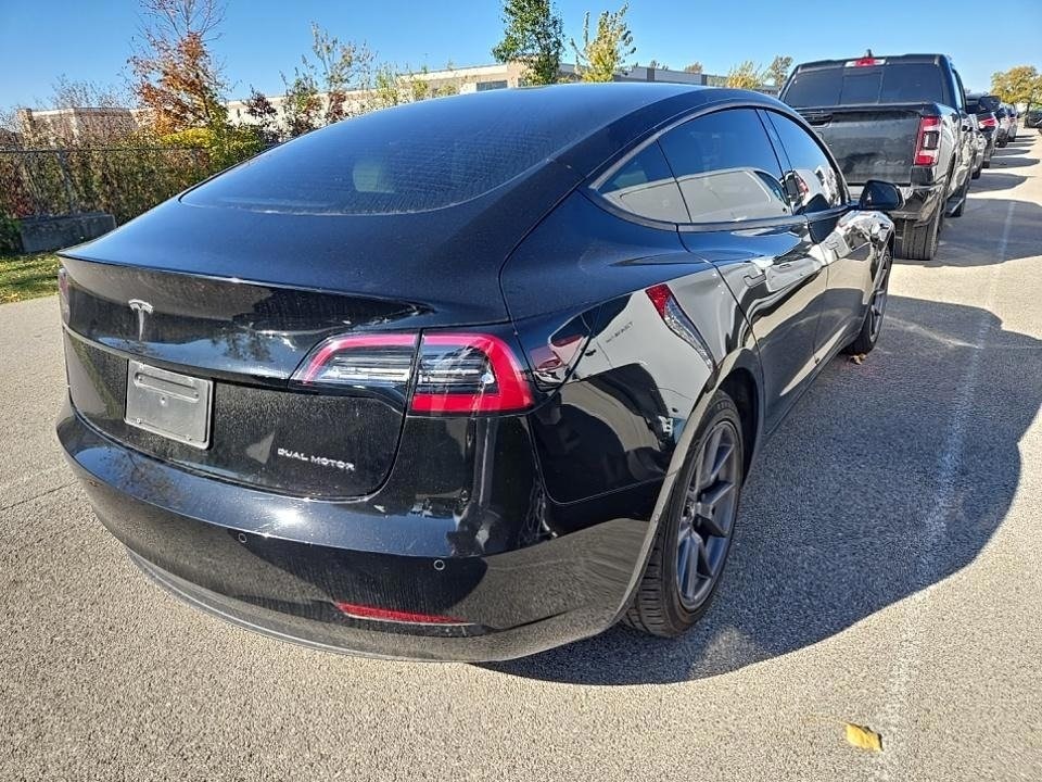 Used 2021 Tesla Model 3 Base with VIN 5YJ3E1EB7MF059701 for sale in Lawrence, KS