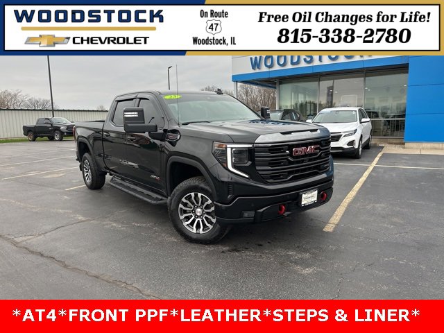 Used 2023 Onyx Black GMC AT4 image 1