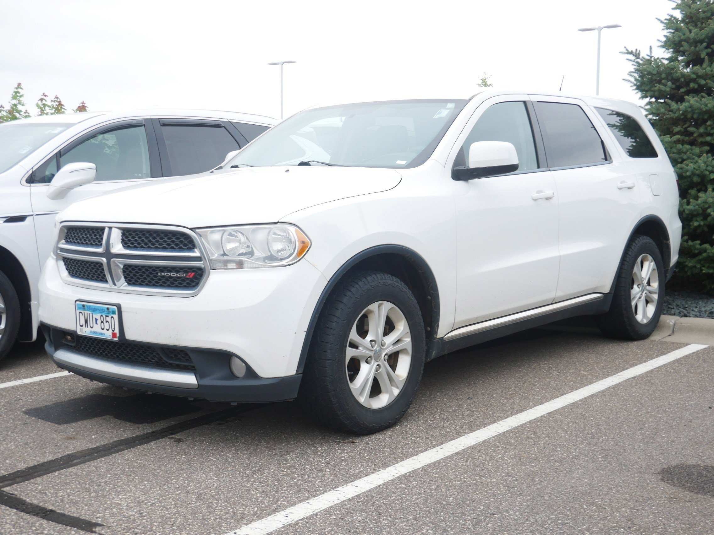 Used 2013 Dodge Durango SXT with VIN 1C4RDJAG8DC665553 for sale in Minneapolis, Minnesota