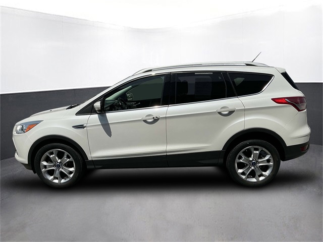 Used 2014 Ford Escape Titanium with VIN 1FMCU9JX0EUD60186 for sale in Kansas City