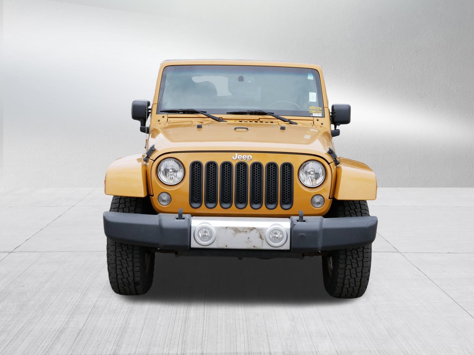 Used 2014 Jeep Wrangler Unlimited Sahara with VIN 1C4BJWEGXEL186571 for sale in Brooklyn Park, Minnesota