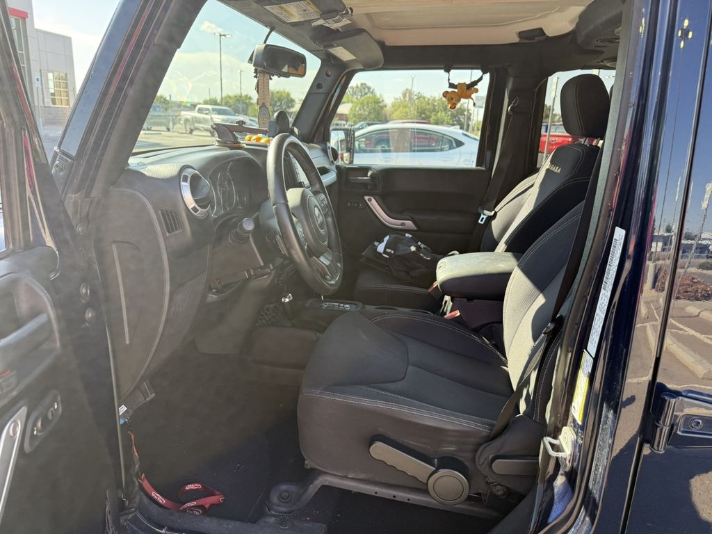 Used 2013 Blue Jeep Unlimited Sahara image 6