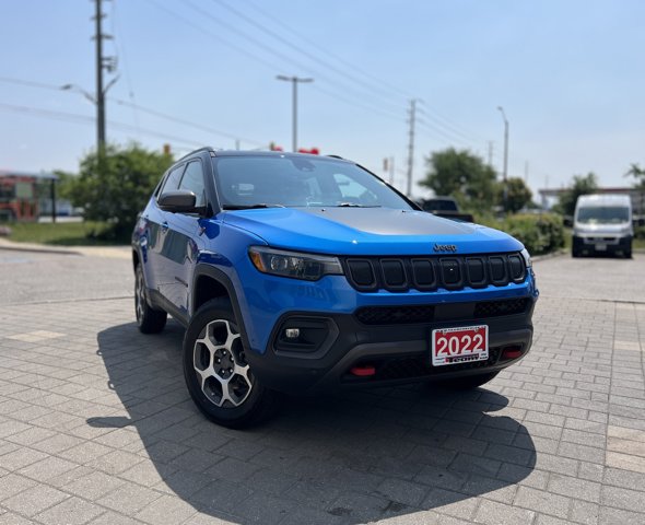 Used 2022 Laser Blue Pearl Jeep Trailhawk Elite image 1
