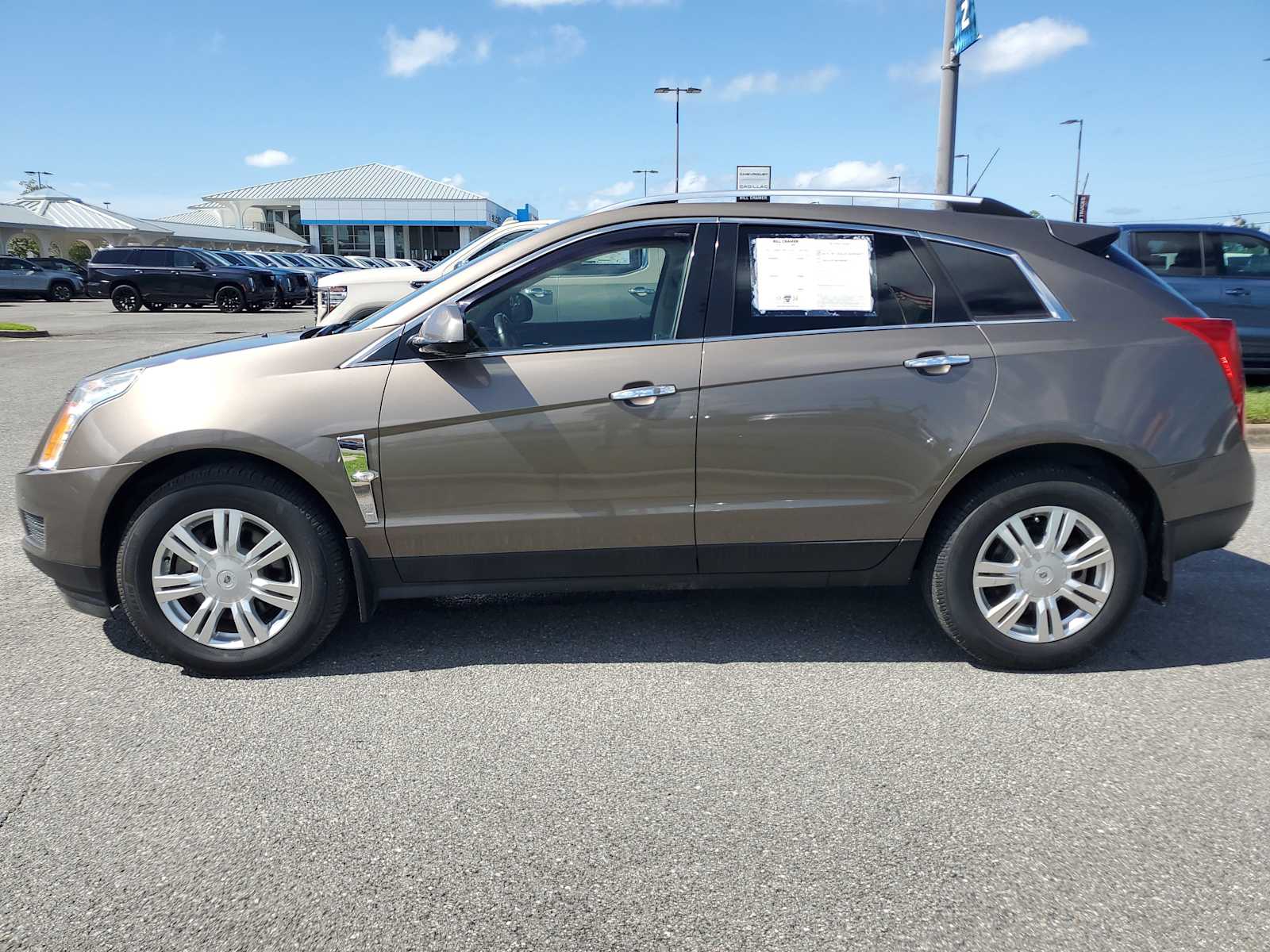 Used 2012 Cadillac SRX Luxury Collection with VIN 3GYFNAE3XCS511775 for sale in Panama City, FL