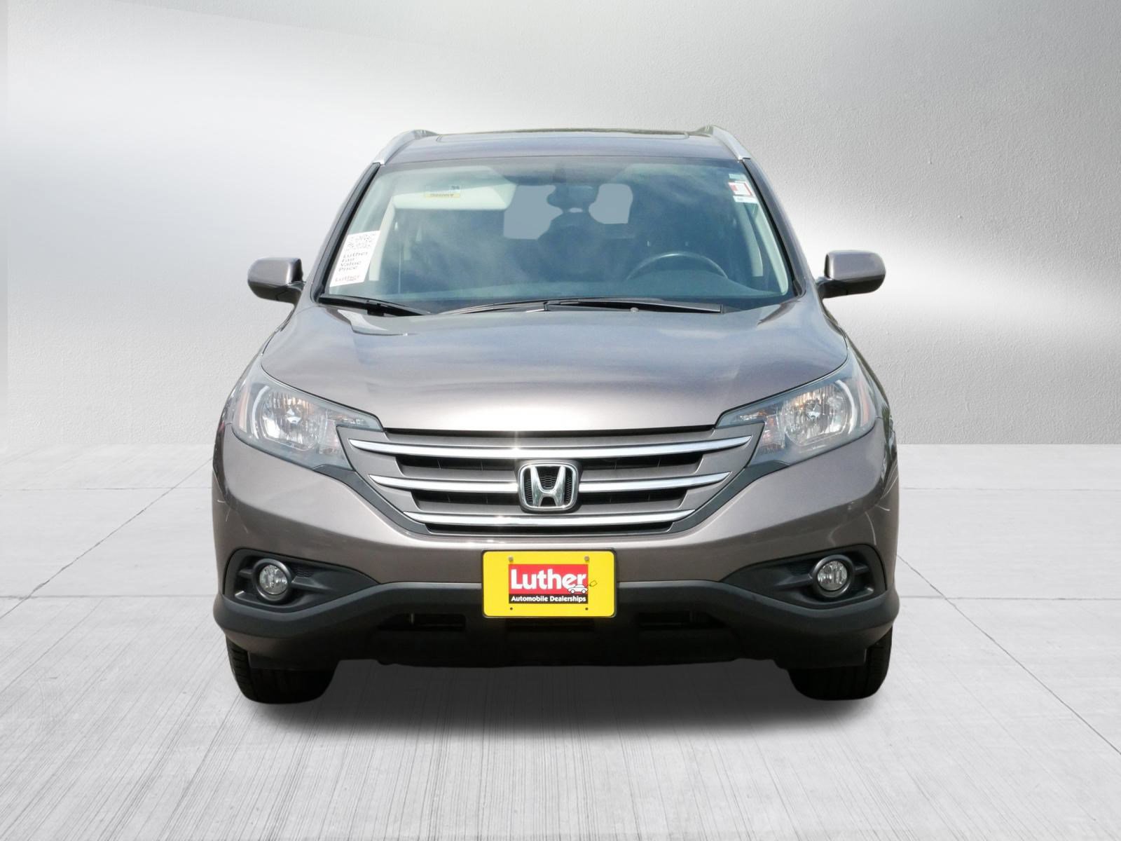 Used 2014 Honda CR-V EX-L with VIN 2HKRM4H79EH664909 for sale in Hopkins, Minnesota