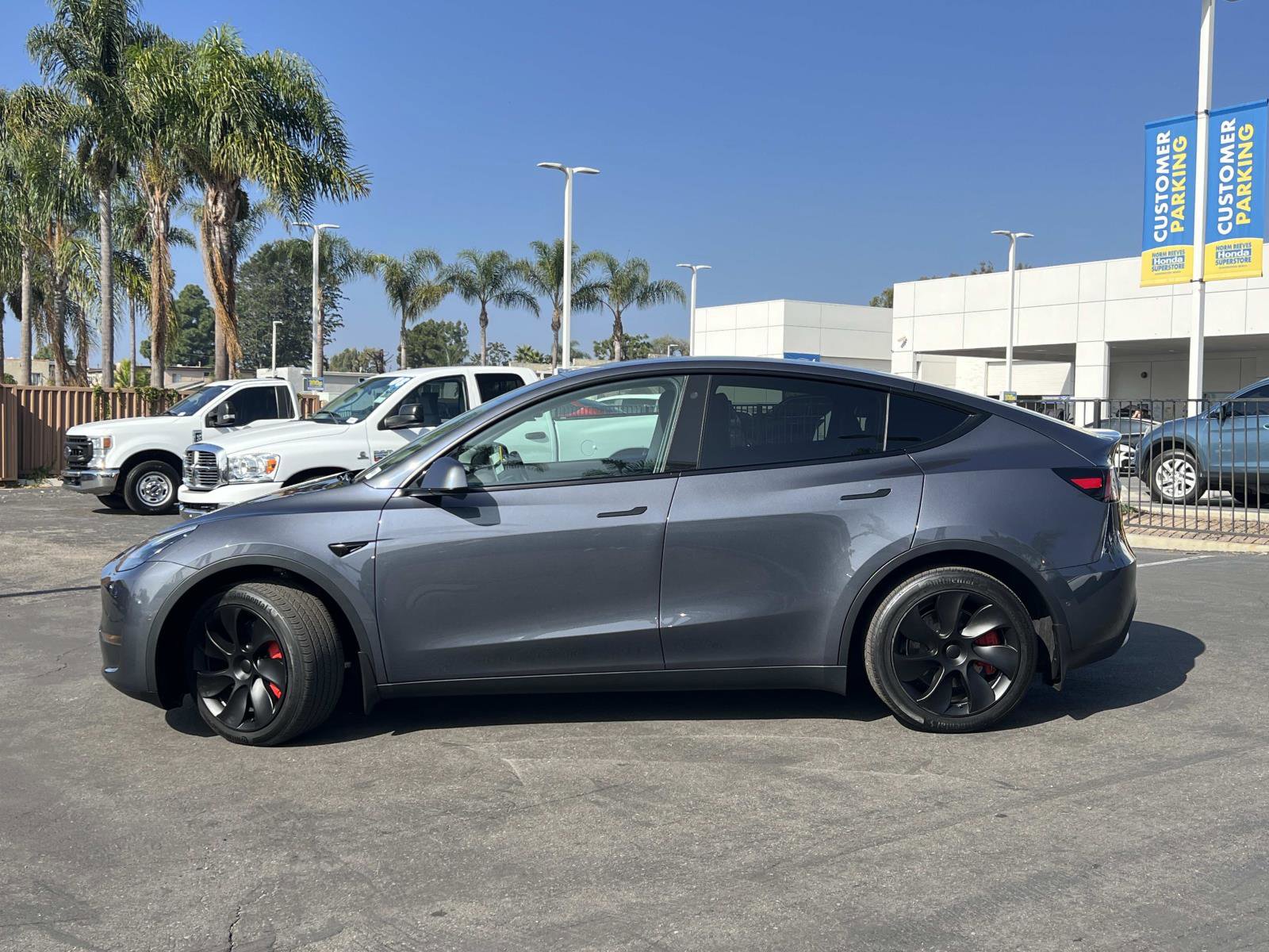 Used 2021 Tesla Model Y Long Range with VIN 5YJYGDEE7MF297866 for sale in Huntington Beach, CA