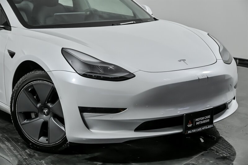 Used 2022 Tesla Model 3 Base with VIN 5YJ3E1EA7NF102006 for sale in Aurora, IL