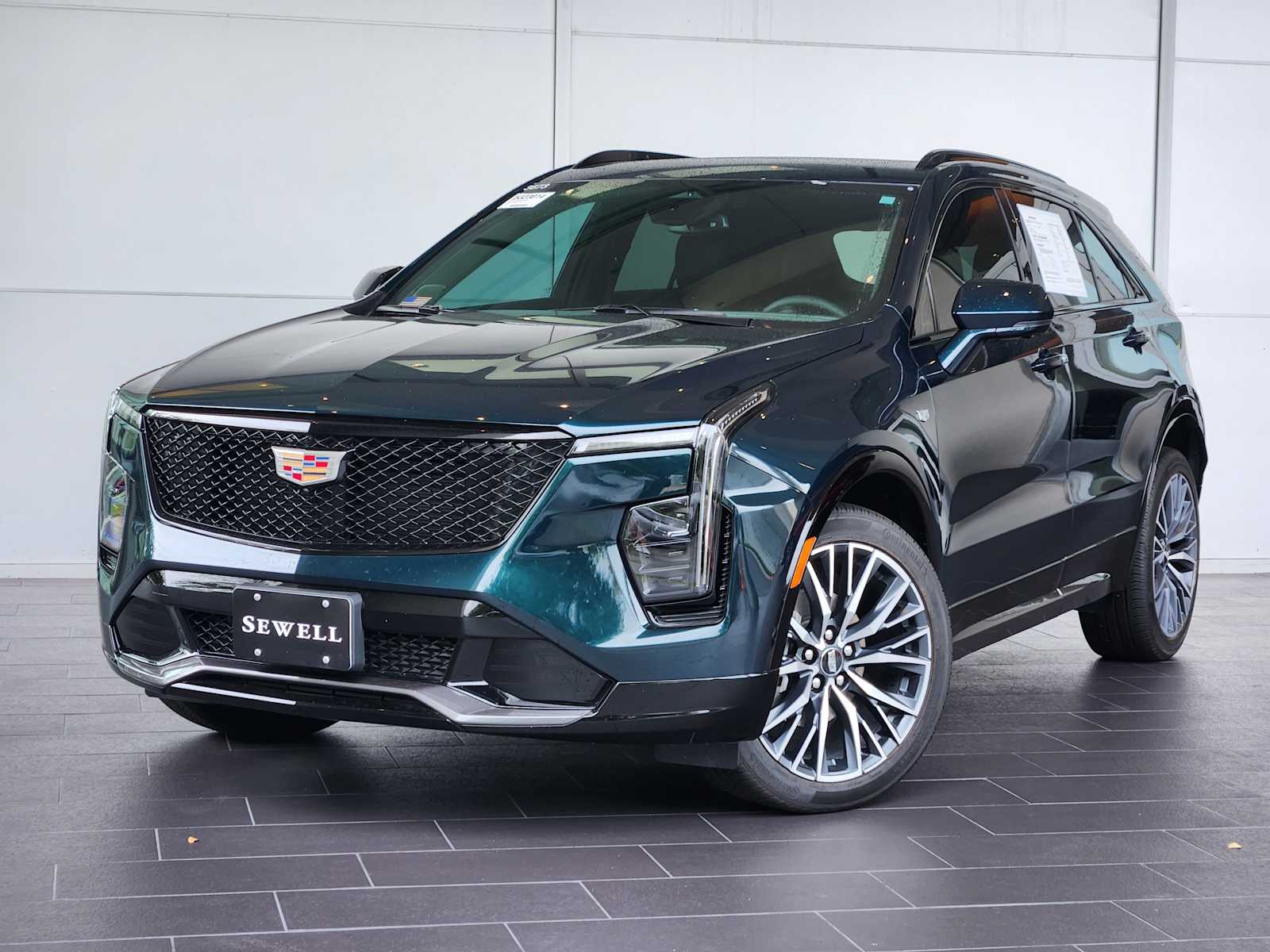 New 2025 Emerald Lake Metallic Cadillac Sport image 1