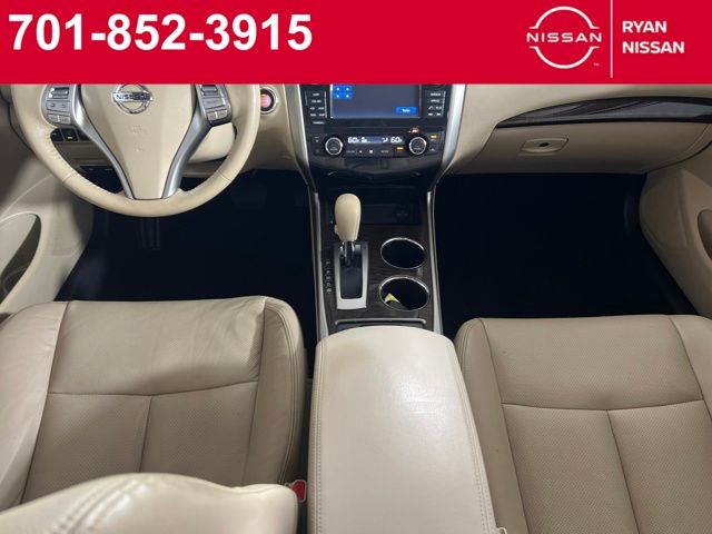 Used 2015 Nissan Altima SL with VIN 1N4AL3AP8FN879273 for sale in Minot, ND