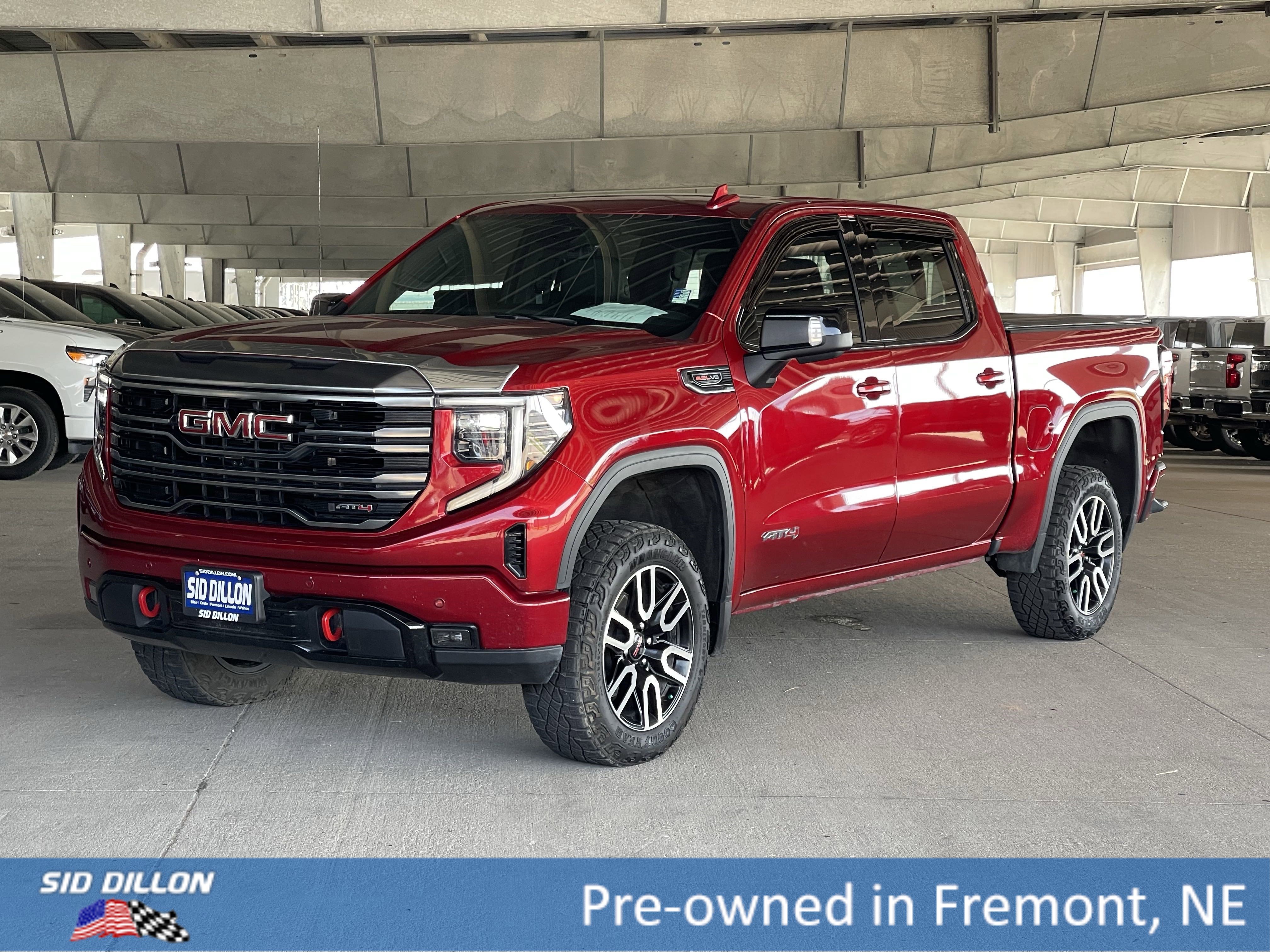 Used 2024 Volcanic Red Tintcoat GMC AT4 image 1