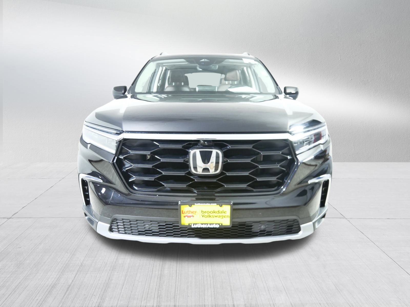 Used 2024 Honda Pilot Elite with VIN 5FNYG1H82RB018268 for sale in Brooklyn Center, Minnesota