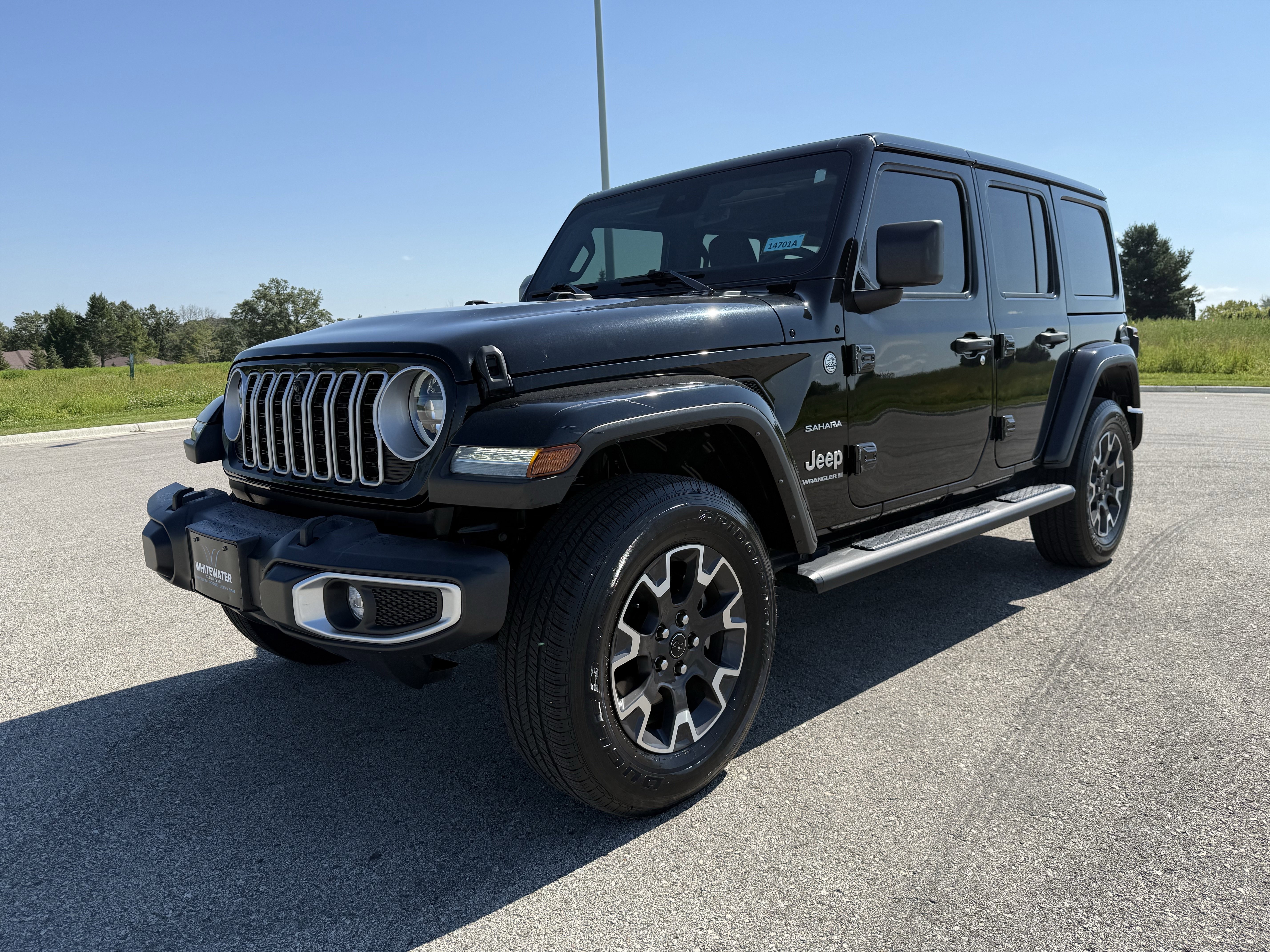 Certified 2024 Jeep Wrangler 4-Door Sahara with VIN 1C4PJXEN1RW135474 for sale in Saint Charles, Minnesota
