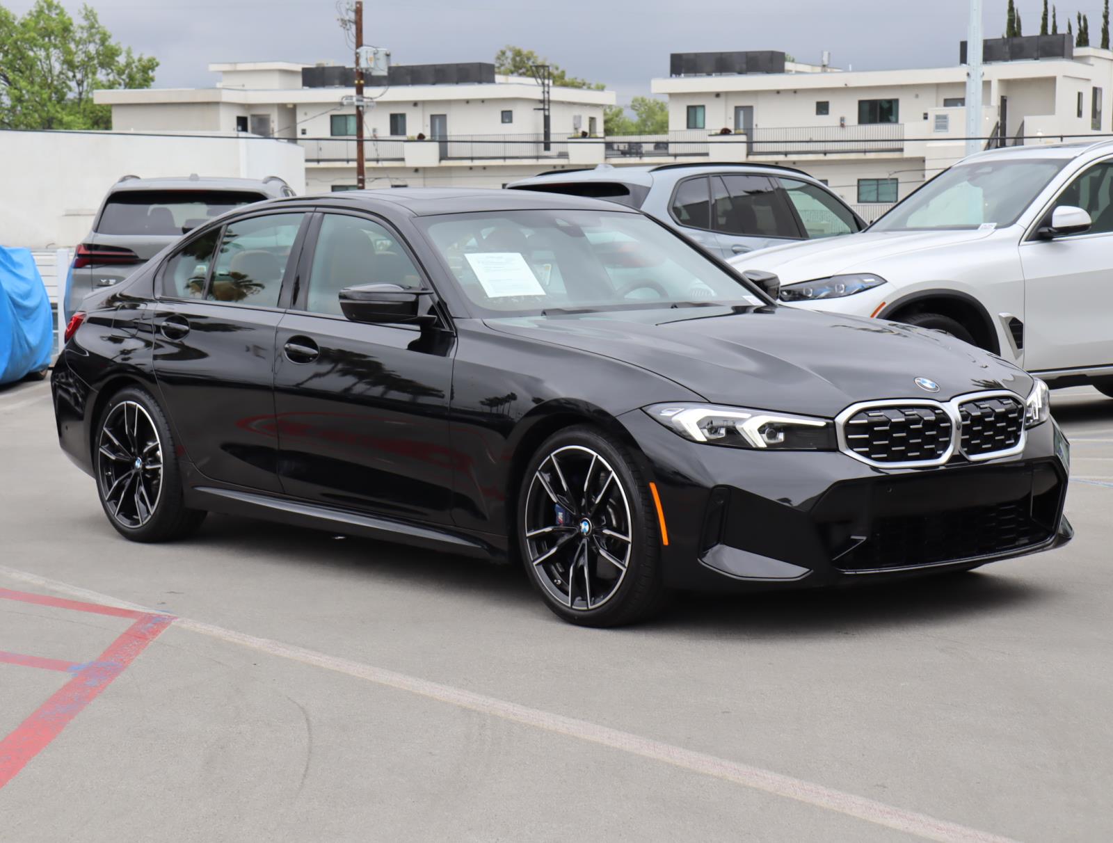 Used 2024 Black Sapphire Metallic BMW M340i Sedan image 1