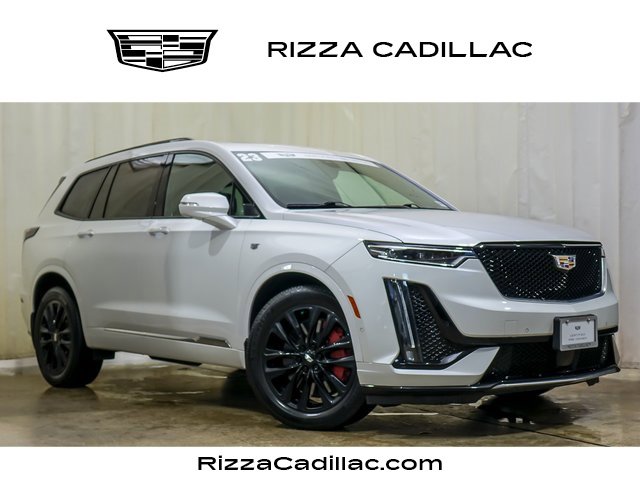 Used 2023 Crystal White Tricoat Cadillac Sport image 1