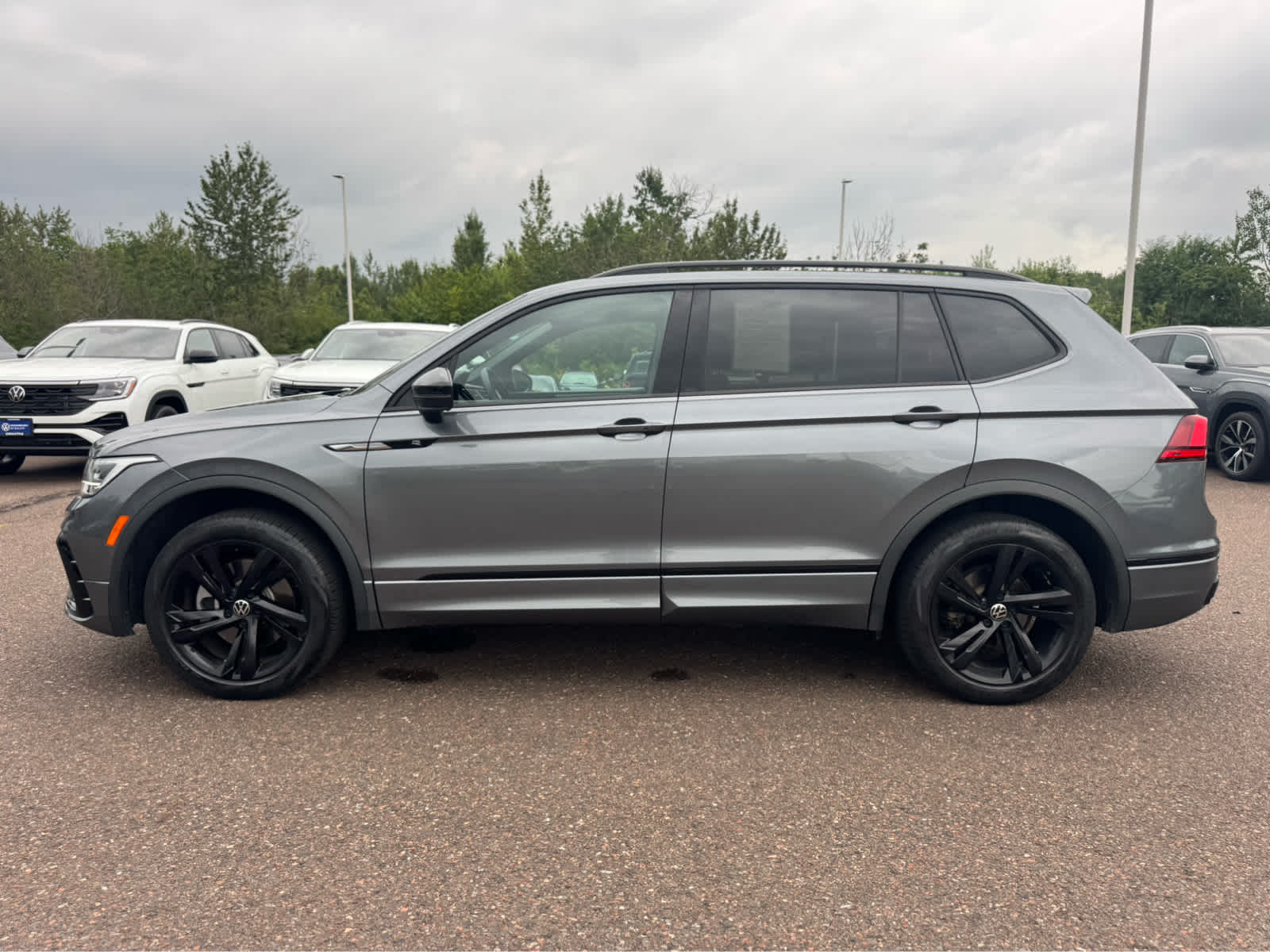 Certified 2023 Volkswagen Tiguan SE R-LINE BLACK with VIN 3VVCB7AX7PM057672 for sale in Hermantown, Minnesota