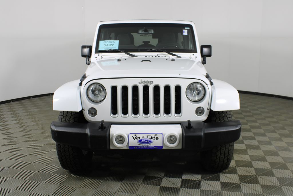 Used 2016 Jeep Wrangler Unlimited Sahara with VIN 1C4BJWEG0GL137835 for sale in Mitchell, SD