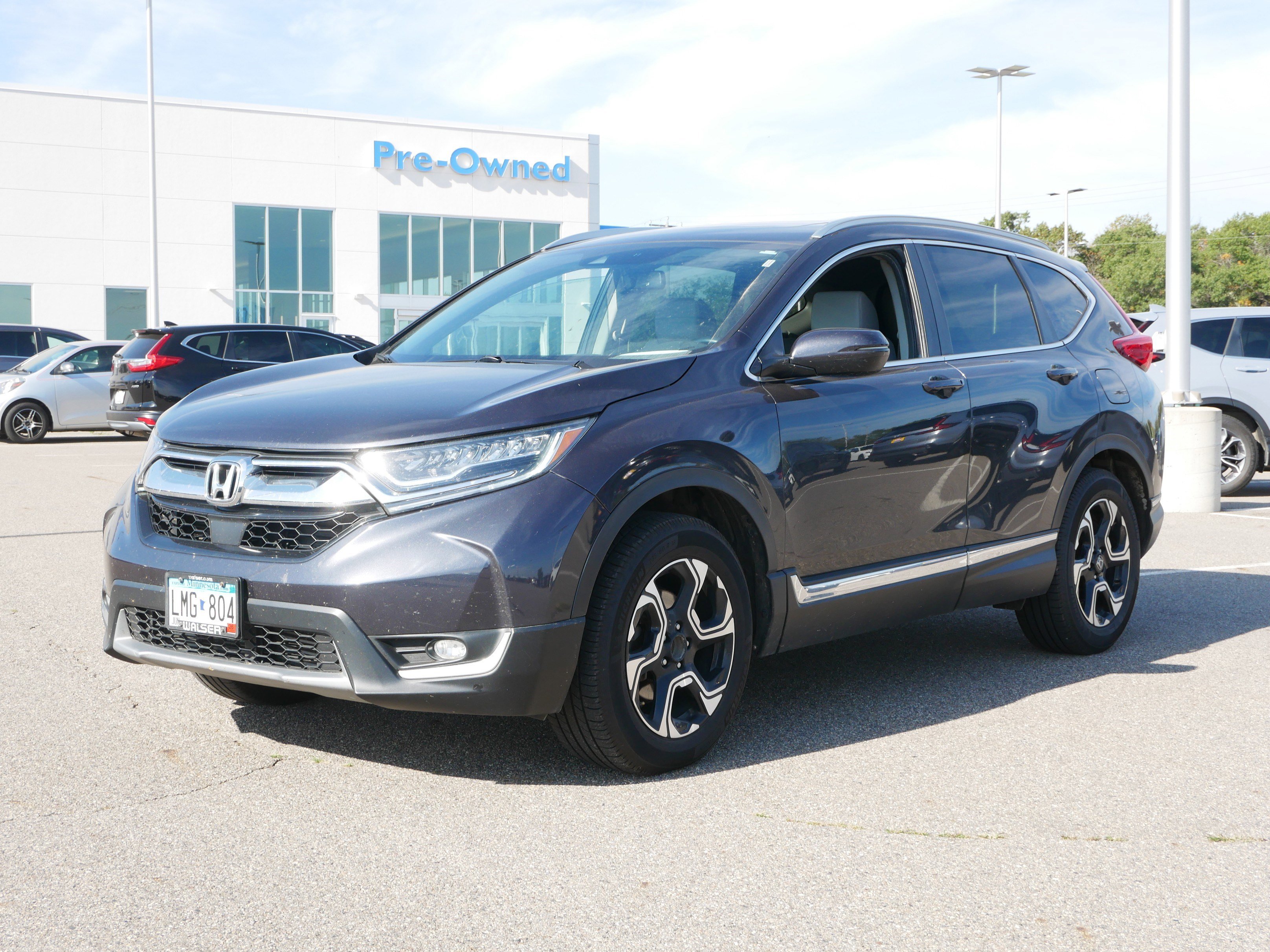 Used 2017 Honda CR-V Touring with VIN 5J6RW2H99HL041655 for sale in Waite Park, Minnesota