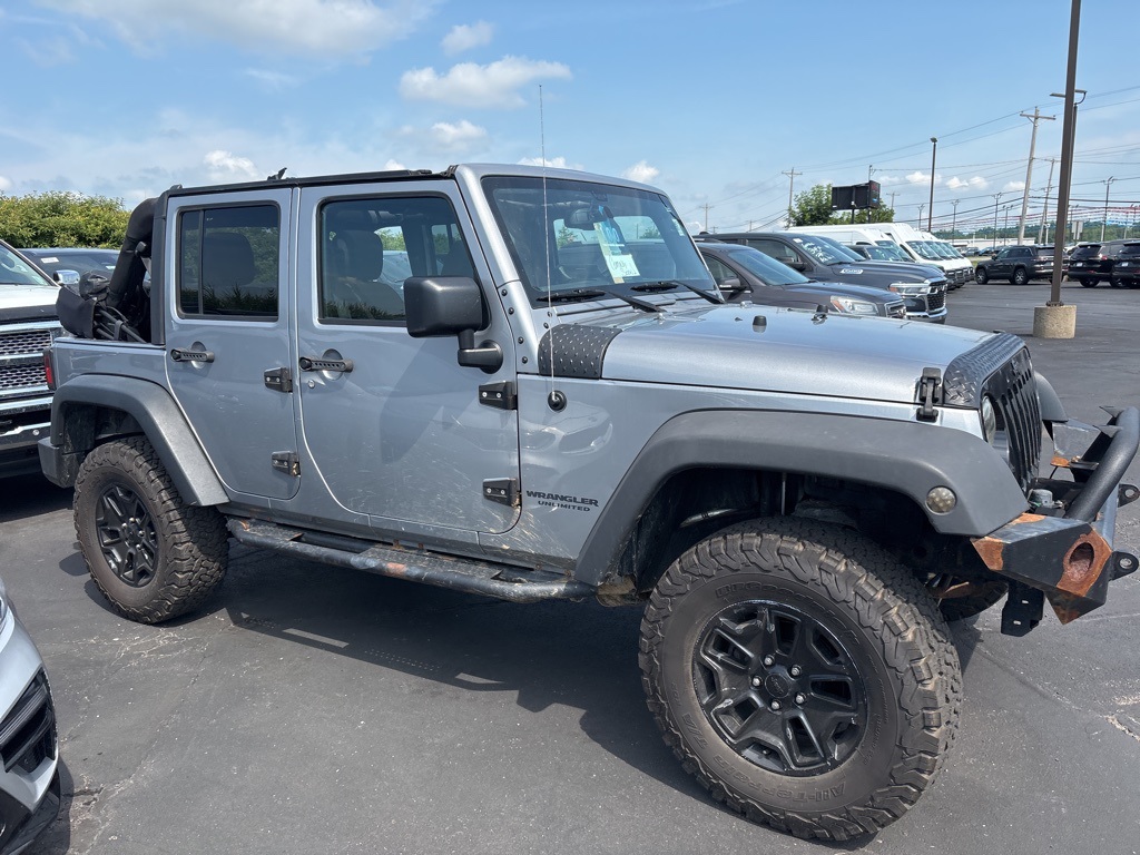 Used 2015 Jeep Wrangler Unlimited Sport with VIN 1C4BJWDG8FL535410 for sale in Shelby, OH