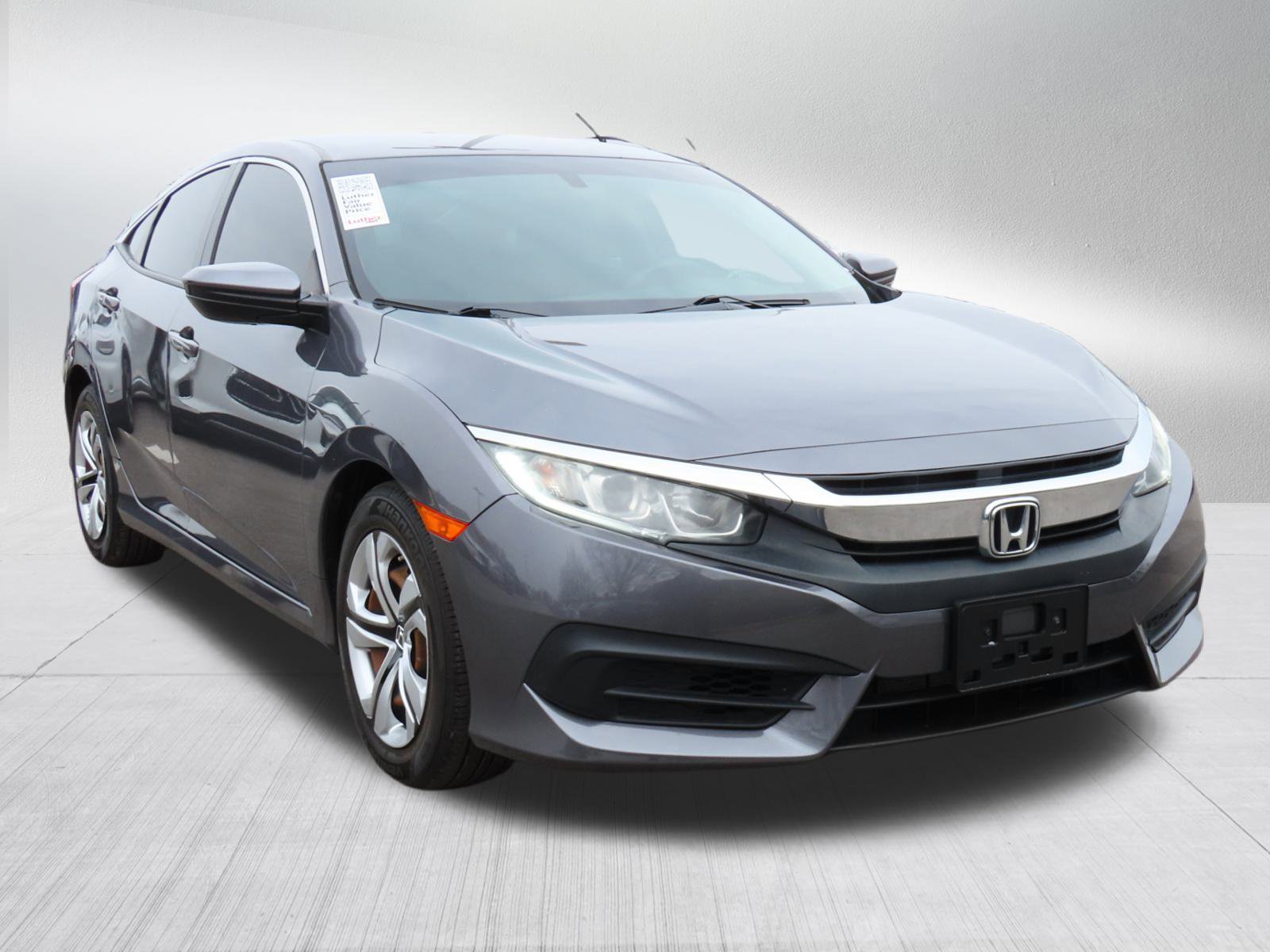Used 2018 Honda Civic LX with VIN 19XFC2F59JE034284 for sale in Kansas City