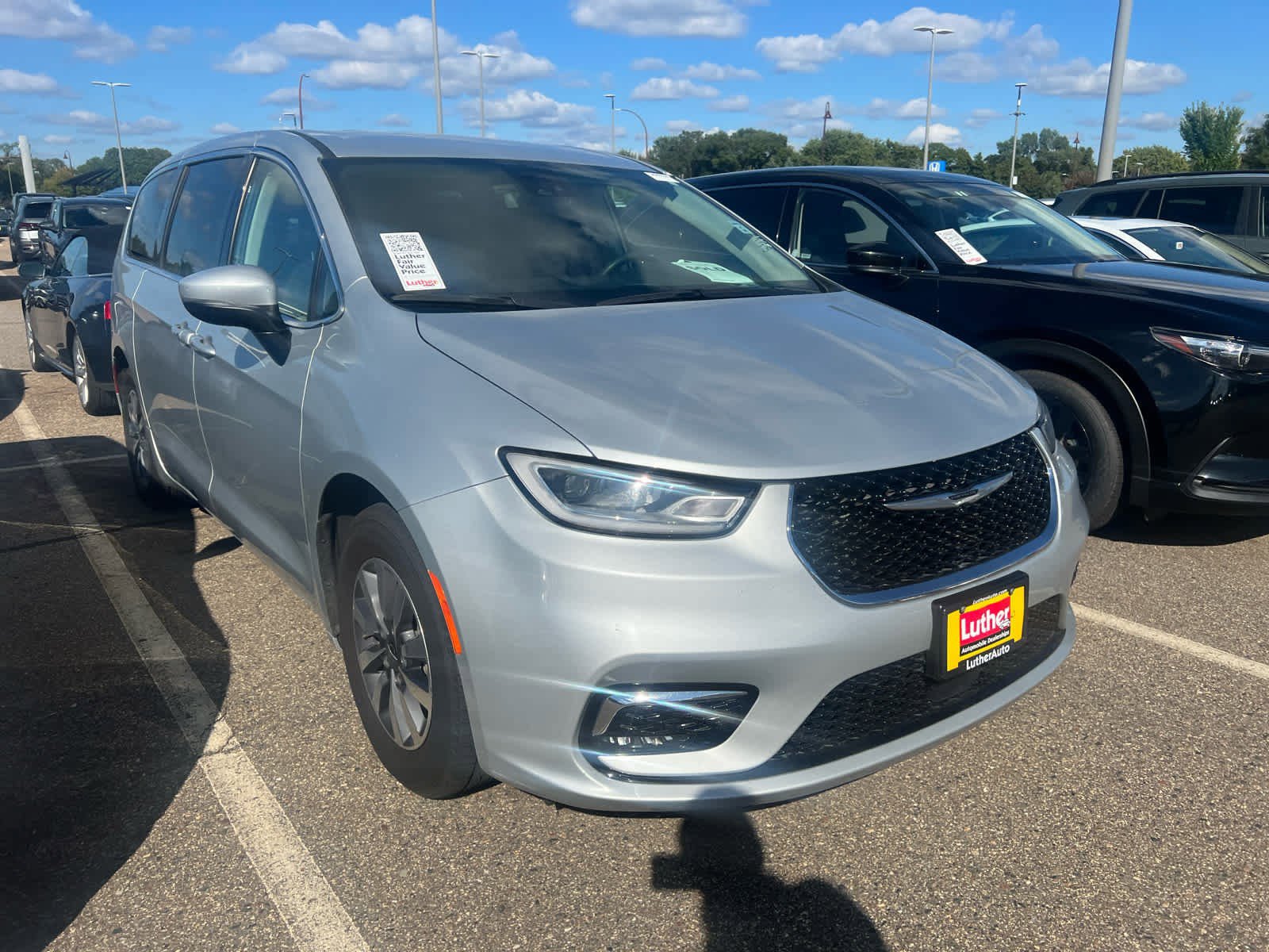 Used 2023 Chrysler Pacifica Hybrid Touring L with VIN 2C4RC1L77PR556190 for sale in Brooklyn Center, Minnesota